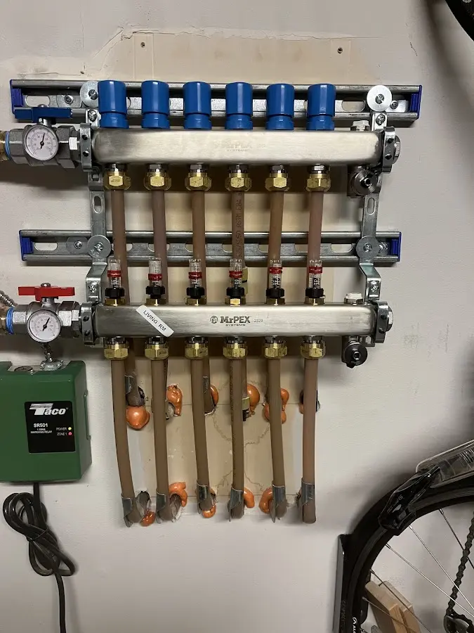 Plumber performing Water Heater Repair at a residential property in Eunice